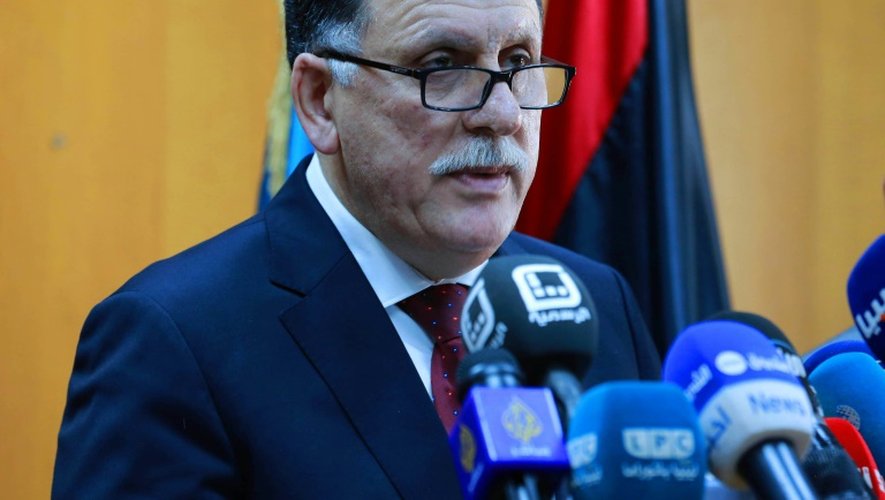 Le chef du gouvernement d'union nationale libyen, Fayez al-Sarraj, lors d'une conférence de presse à son arrivée le 30 mars 2016 à Tripoli