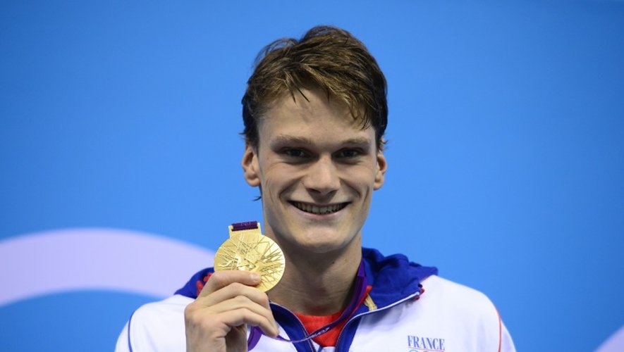 Yannick Agnel avec sa médaille d'or des JO-2012 sur 200 m nage libre, le 30 juillet 2012 à Londres