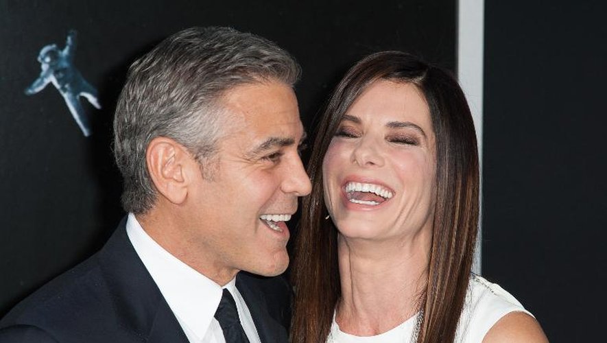 George Clooney et Sandra Bullock, les deux acteurs du film britannique Gravity qui a raflé la majorité des Oscars techniques en 2014