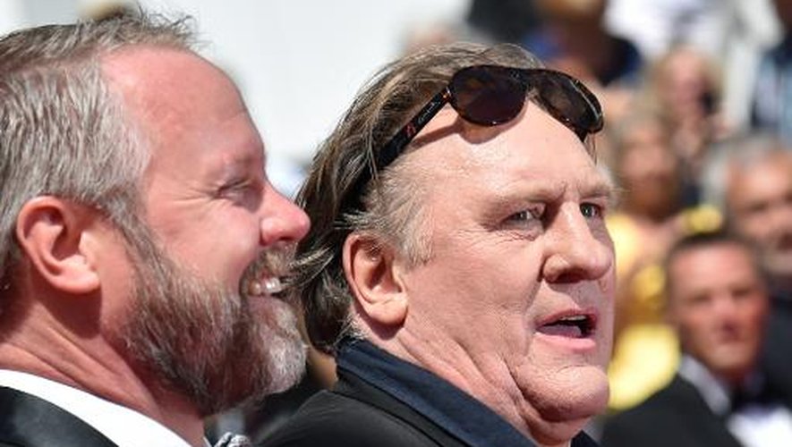 Les acteurs Dan Warner et Gérard Depardieu arrivent à la projection de "Valley of Love", au 68e festival de Cannes, le 22 mai 2015