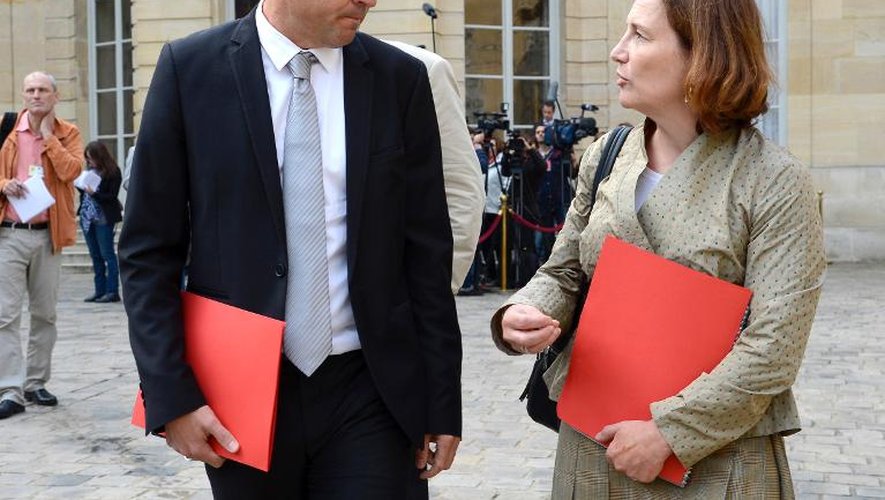 Le secrétaire général de la CFDT, Laurent Berger, et Véronique Descacq à Matignon, le 26 août 2013 à Paris