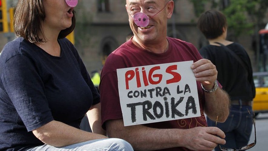 Des Espagnols manifestent contre la Troïka et l'austérité, à Madrid le 1er juin 2013