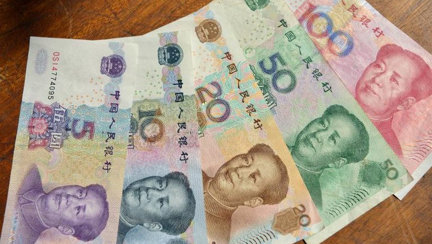 Des billets de la monnaie chinoise, le yuan, le 17 mars 2014