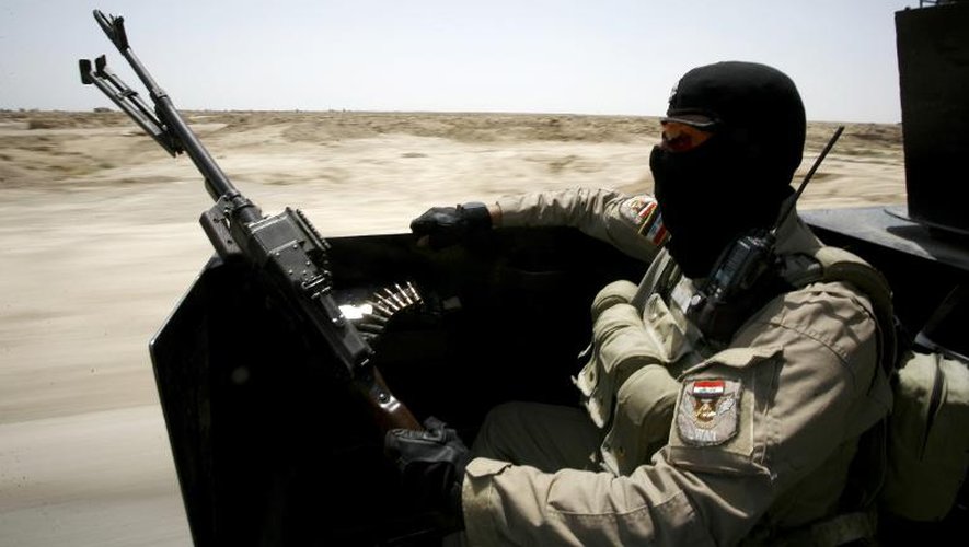 Un membre des forces gouvernemantales irakiennes dans la région de Jurf al-Sakher, à 50 kilomètres au sud de Bagdad, le 24 mai 2015