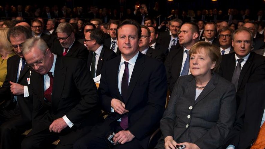 La chancelière allemande Angela Merkel et le Premier ministre britannique David Cameron à l'ouverture du Cebit, le salon des hautes technologies de Hanovre, le 9 mars 2014
