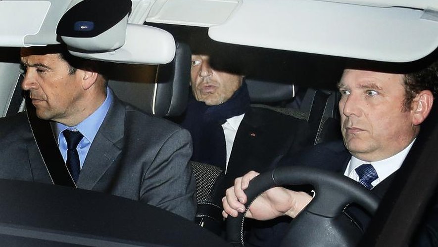 L'ex-président Nicolas Sarkozy quitte le tribunal de Bordeaux le jour de sa mise en examen dans l'affaire Bettencourt, le 21 mars 2013
