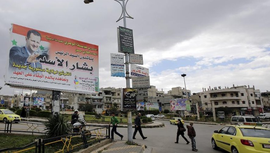 Une affiche du président Bachar al-Assad, à Homs, le 13 mars 2014