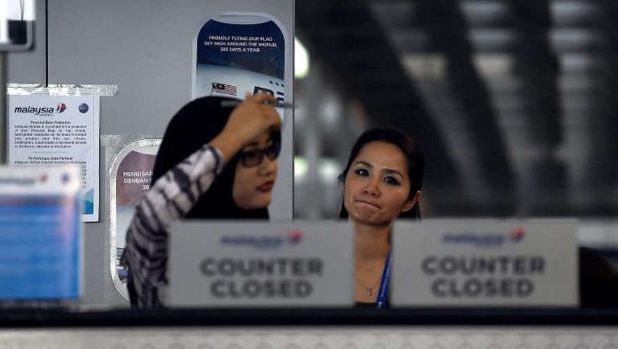 Des hôtesses de la Malaysia Airlines, à l'aéroport international de Kuala Lumpur, à Sepang, en Malaisie, le 1er juin 2015