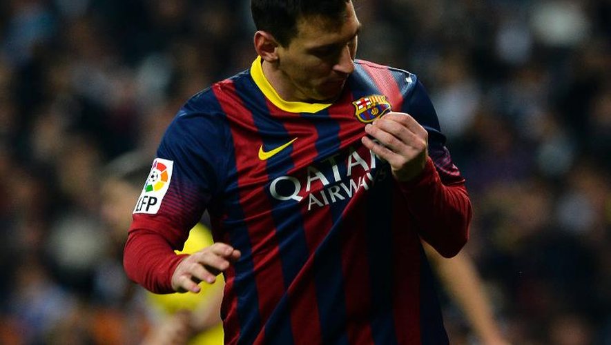 Lionel Messi, du FC Barcelone, contre le Real Madrid dans le clasico en Championnat d'Espagne le 23 mars 2014 au stade Santiago Bernabeu