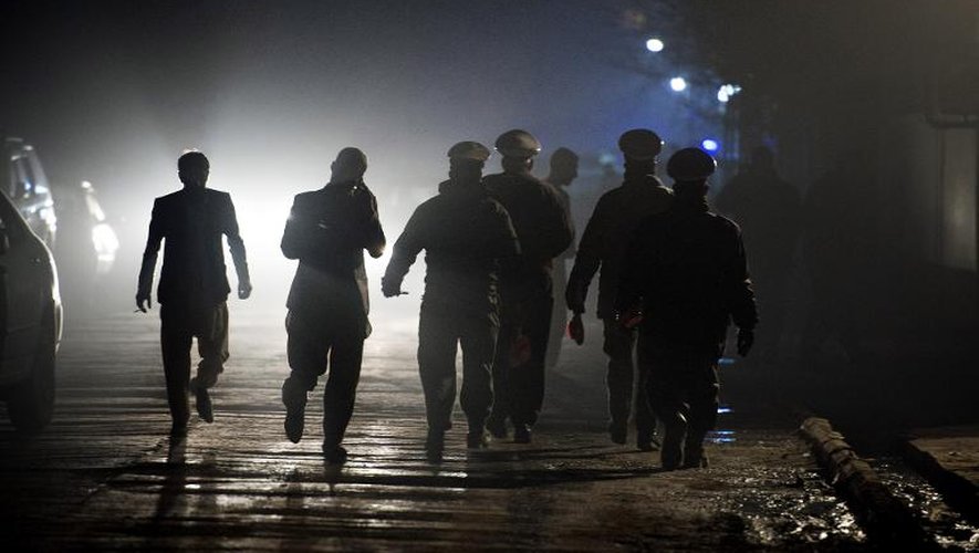 La police afghane arrive sur le lieu d'une explosion, à Kaboul le 17 janvier 2014