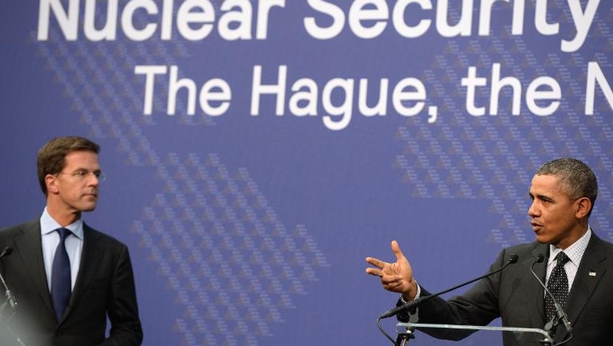 Le président américain Barack Obama avec le Premier ministre néerlandais Mark Rutte lors de la conférence de presse finale du sommet nucléaire à La Haye, le 25 mars 2014