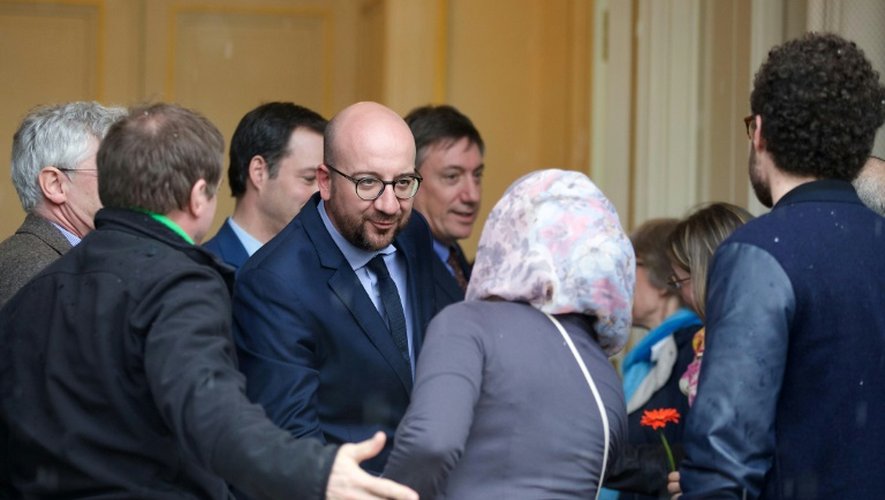 Le Premier ministre Charles Michel reçoit une délégation des proches des victimes des attentats de Bruxelles du 22 mars après la marche contre le terrorisme à Bruxelles le 17 avril 2016