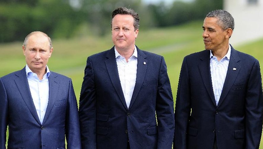 Vladimir Poutine (G), David Cameron (C) et Barack Obama, lors du G8 en Irlande du Nord, le 18 juin 2013