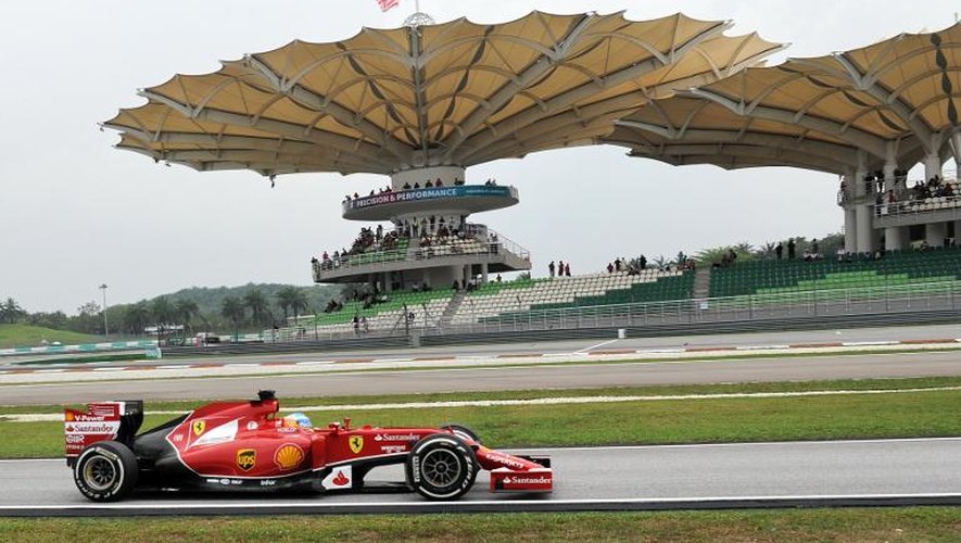 Le pilote espagnol Fernado Alonso (Ferrari) pendant la 3e séance d'essais qualificatifs du Grand Prix de Malaisie de F1 le 29 mars 2014 à Sepang