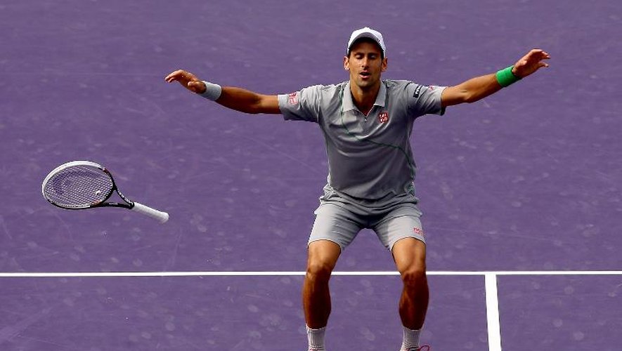 Novak Djokovic après avoir gagné la balle de match contre Rafael Nadal en finale du tournoi de Miami le 30 mars 2014 à Key Biscayne