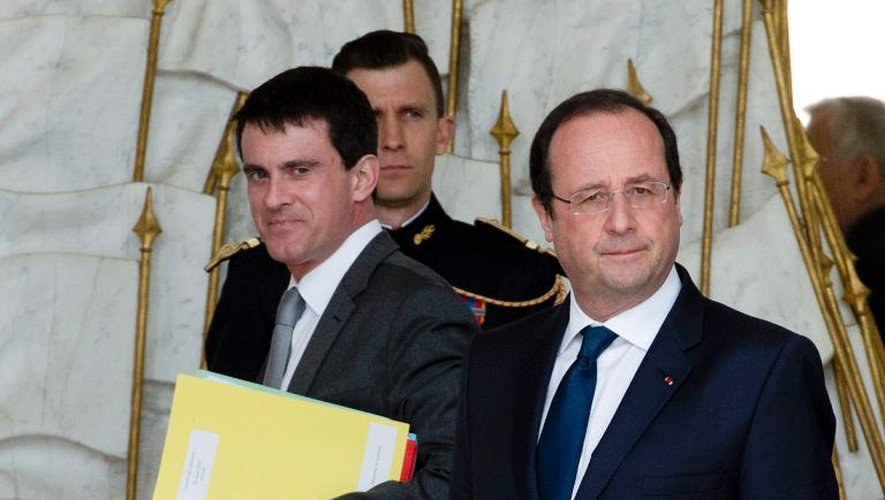 Manuel Valls (gauche) et le président de la République François Hollande à Paris le 19 mars 2014