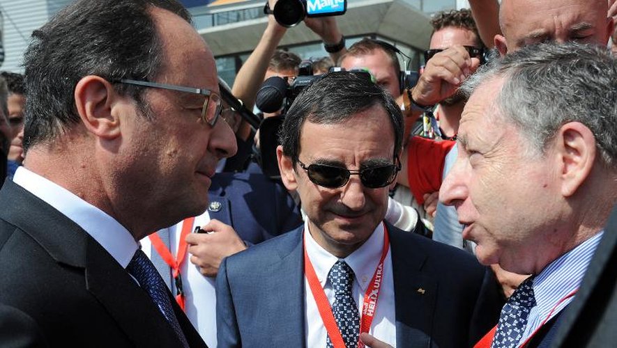 Le président François Hollande, Pierre Fillon (en charge de l'organisation de la course) et Jean Todt, président de la Fédération internationale de l'automobile, le 13 juin 2015 au Mans