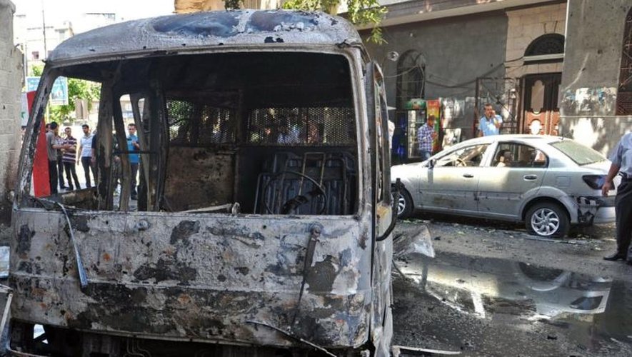 Une photo fournie le 23 juin 2013 par l'agence Sana montre les lieux d'un attentat meurtrier à Damas