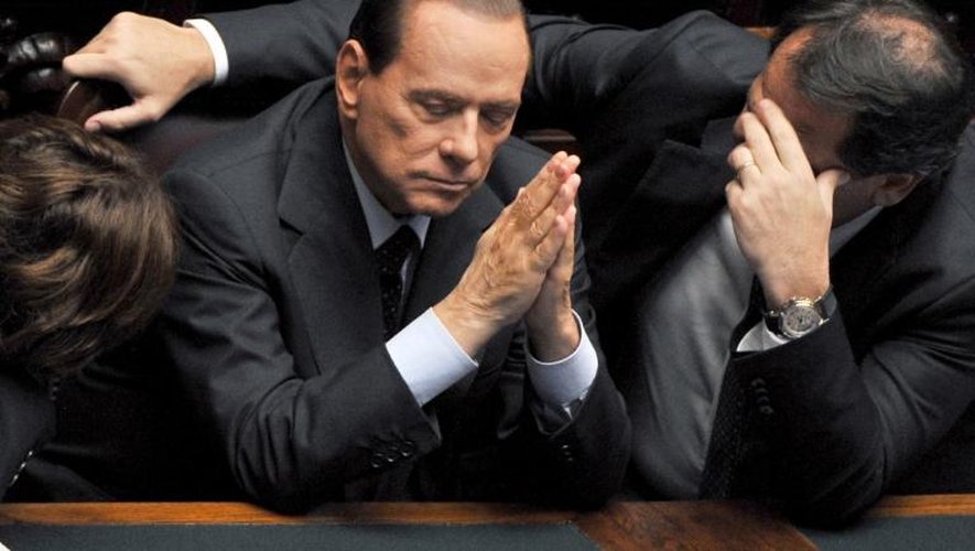 Silvio Berlusconi (C) à Rome, le 14 septembre 2013