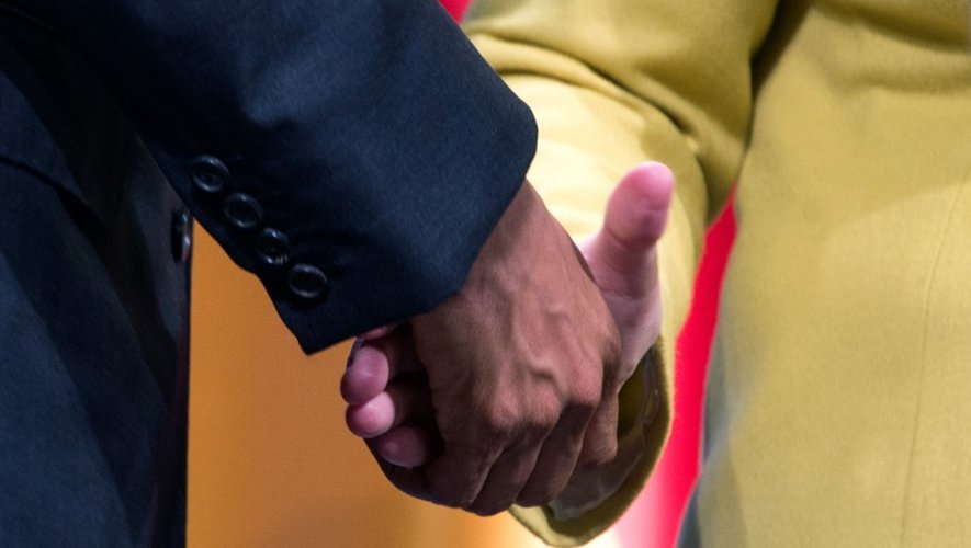 Poignée de mains entre Barack Obama et Angela Merkel à Hanovre le 24 avril 2016