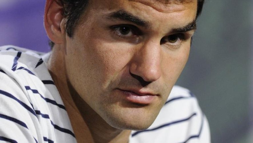 Le Suisse Roger Federer lors de sa conférence de presse après sa défaite à Wimbledon, le 26 juin 2013
