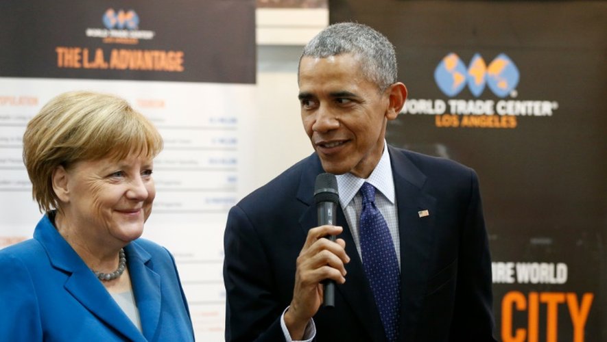 Le président américain Barack Obama et la chancelière allemande Angela Merkel, lors d'un discours commun à la foire industrielle de Hanovre, le 25 avril 2016
