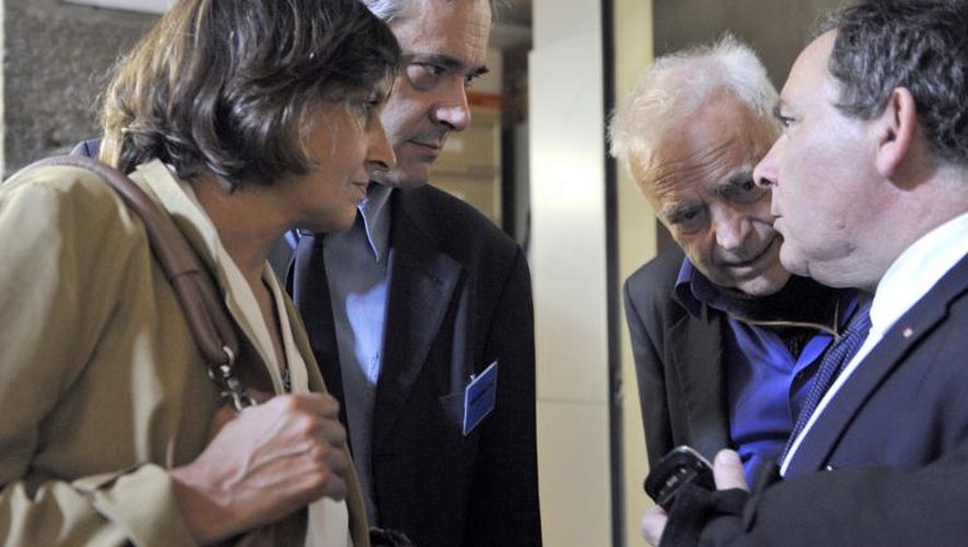 Les parents d'Agnès Marin et leur avocat Francis Szpiner le 18 juin 2013 au Puy-en-Velay