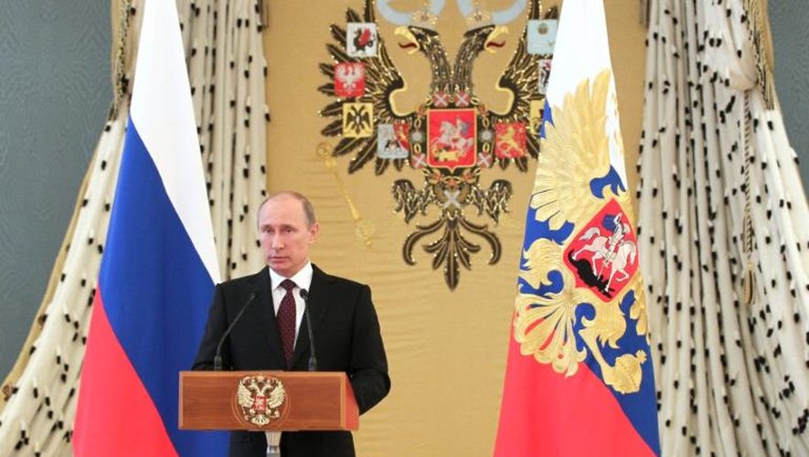 Le président russe, Vladimir Poutine, à la tribune du Kremlin, le 26 juin 2013 à Moscou