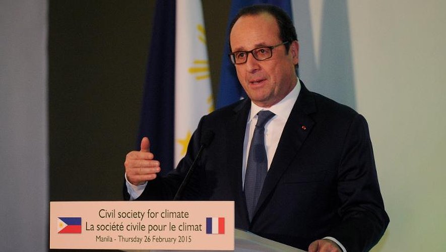François Hollande parle à Manille le 26 février 2015 à Manille pour préparer les esprits avant la conférence internationale sur le climat, la COP-21, dont le succès n'est pas assuré