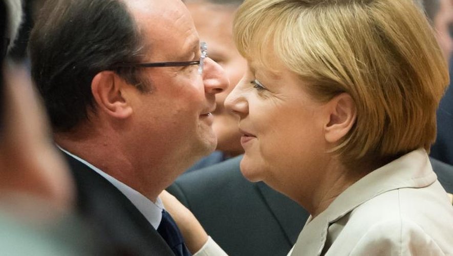 Le président français François Hollande et la chancelière allemande Angela Merkel lors d'une réunion à Bruxelles, le 7 juin 2013