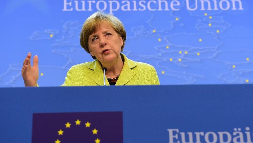 La chancelière allemande Angela Merkel s'exprime à la sortie du sommet extraordinaire de la zone euro, le 22 juin 2015 à Bruxelles
