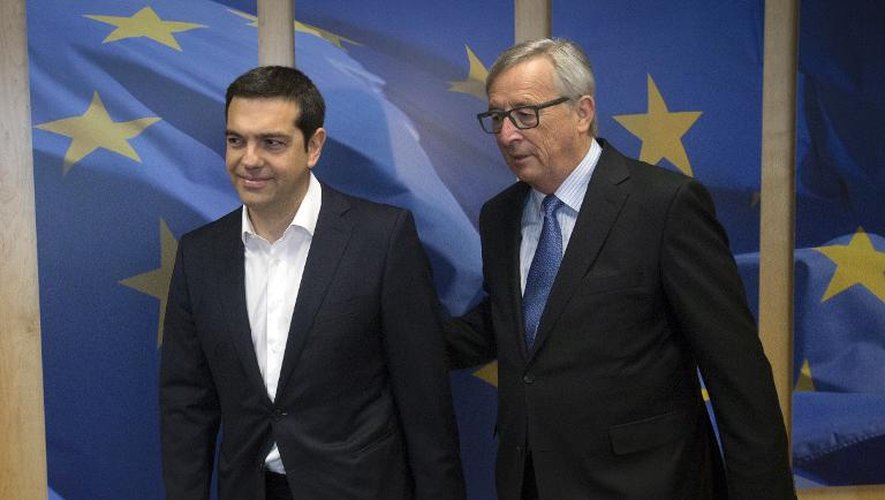 Le Premier ministre grec Alexis Tsipras et le président de la commission européenne Jean-Claude Juncker le 22 mai 2015 à Bruxelles