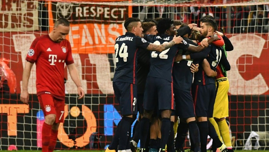 Les joueurs de l'Atletico Madrid  exultent après leur qualification pour la finale de la Ligue des champions aux dépens du Bayern, le 3 mai 2016 à Munich