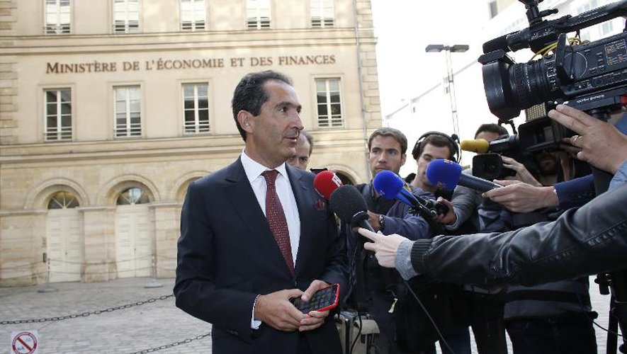 Le patron d'Altice, Patrick Drahi, quitte Bercy, le 23 juin 2015, après un entretien avec Emmanuel Macron