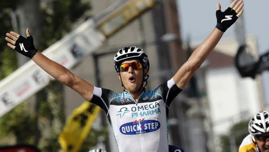 L'Italien Matteo Trentin (Omega Pharma) victorieux sur la ligne d'arrivée de la 14e étape du Tour de France, le 13 juillet 2013 à Lyon