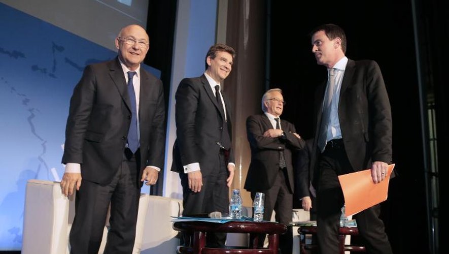 Michel Sapin, Arnaud Montebourg,  Francois Rebsamen et Manuel Valls le 28 avril 2014 à la Maison de la chimie à Paris