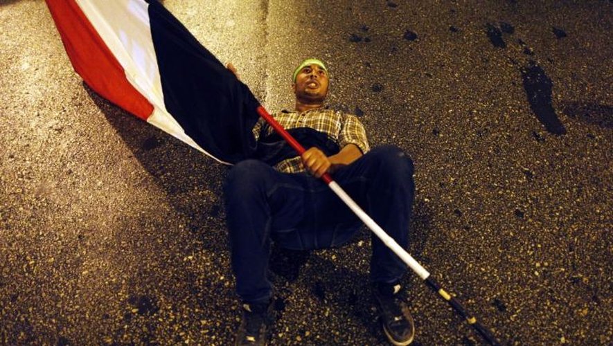 Un sympathisant du président déchu Mohamed Morsi, dans les rues du Caire, le 13 juillet 2013