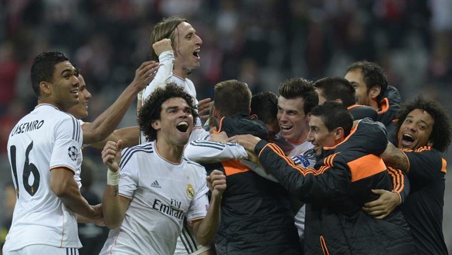 Les joueurs du Real Madrid fêtent leur victoire sur le Bayern Munich, en demi-finale de la Ligue des Champions, le 29 avril 2014 à Munich
