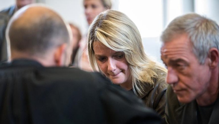 Virginie et Pierre-Marie Cottrez, la fille et le mari de Dominique Cottrez, au procès de leur mère le 25 juin 2015 à Douai