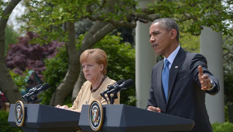 Le président américain Barack Obama et la chancelière allemande Angela Merkel tiennent une conférence de presse à la Maison blanche à Washington, le 2 mai 2014