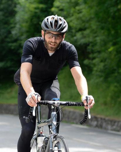 Thibaut Rivière sur son vélo le 18 juillet 2013. Il termine son Tour de France par l'étape Annecy-Le Semnoz