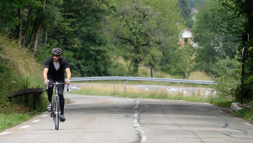 Thibaut Rivière sur son vélo le 18 juillet 2013. Il termine son Tour de France par l'étape Annecy-Le Semnoz