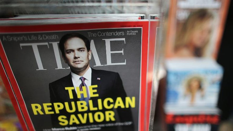 Des exemplaires du magazine Time en vente dans un kiosque de Manhattan, le 13 février 2013