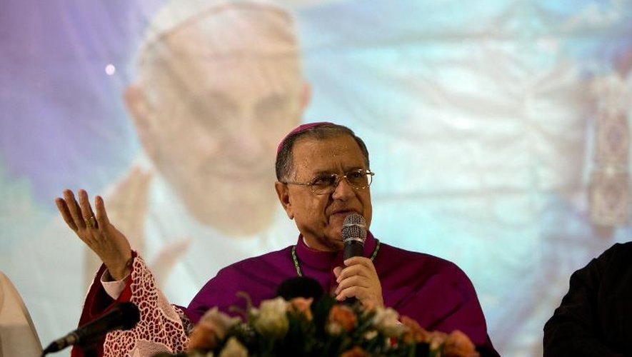 Le patriarche latin de jérusalem Mgr Fouad Twal, lors d'une conférence de presse avant une grande procession mariale à Haïfa, le 11 mai 2014, a regretté les "actes de vandalisme incontrôlés" contre l'église catholique
