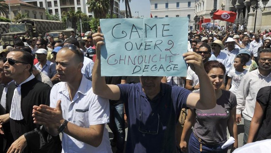 "La partie des finie, Ghanouchi dégage" peut-on lire sur la pancarte d'un manifestant le 26 juillet 2013 à Tunis