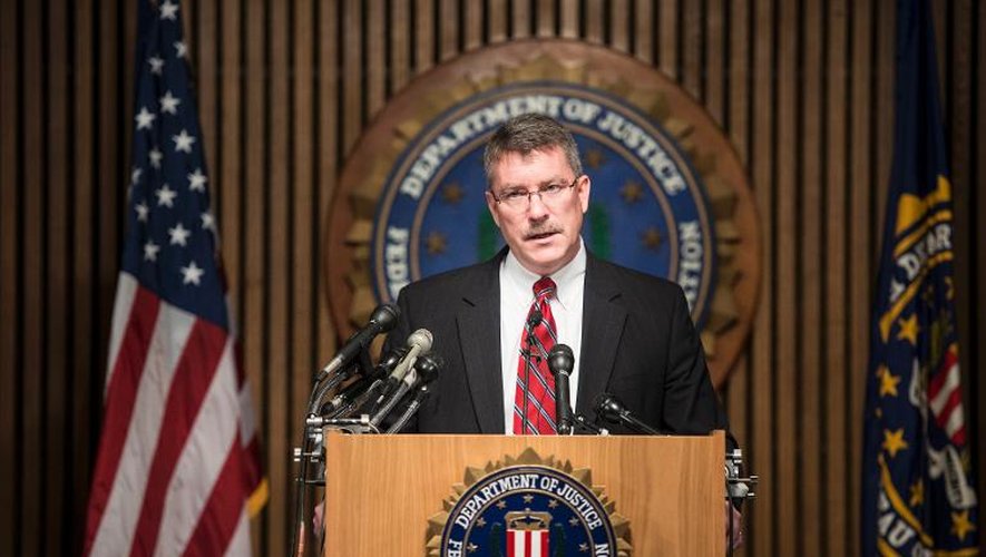 Ronald Hosko, directeur du FBI chargé des enquêtes pénales, tient une conférence de presse sur une vaste opération contre la prostitution infantile, le 29 juillet 2013 à Washington