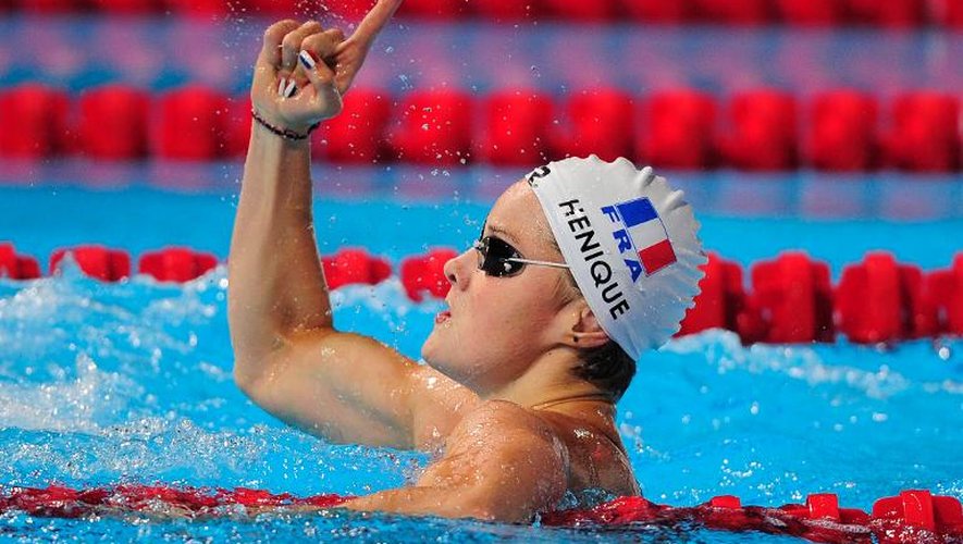 La Française Mélanie Hénique célèbre sa première place des séries du 50 m papillon, le 2 août 2013 lors des Mondiaux à Barcelone.