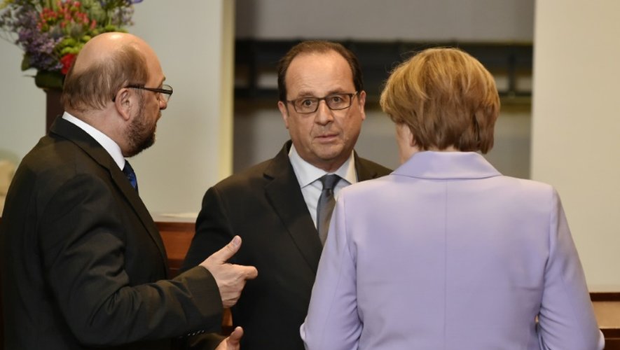 Le président du Parlement européen, Martin Schulz, le président François Hollande et la chancelière Angela Merkel le 23 avril 2015 à Bruxelles