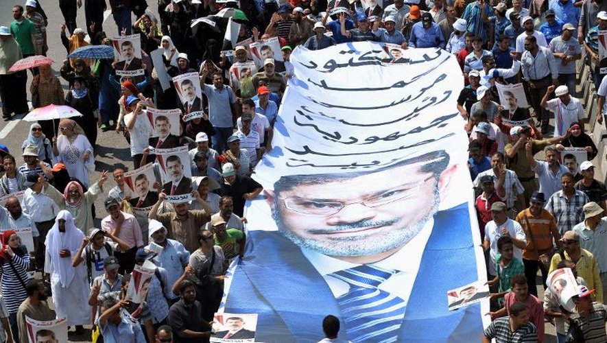 Les partisans de l'ex-président égyptien islamiste Mohamed Morsi défilent au Caire, le 2 août 2013