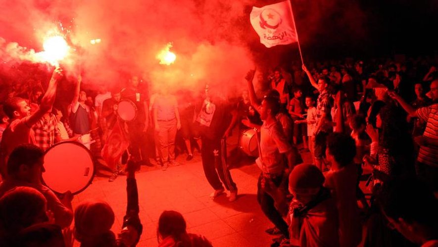 Des militants du parti Ennahda manifestent le 3 août 2013 à Tunis en faveur du gouvernement